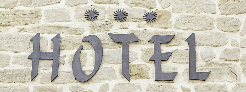 image of a hotel sign using cut out letters